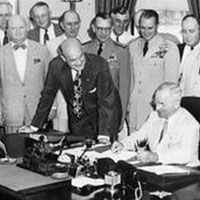 President Truman signing the National Security Act into Law